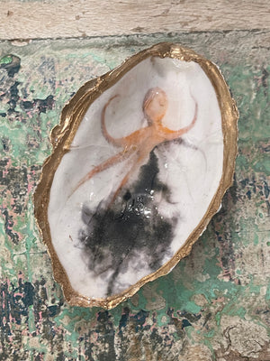 inking octopus oyster shell - fishedimpressions