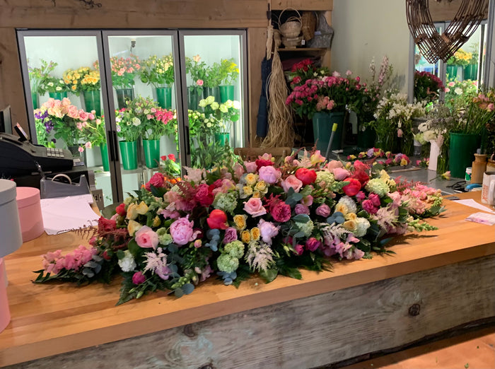 Bright Casket Spray Funeral Flowers of Elegance Droitwich Florist 