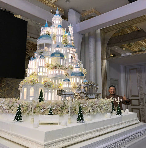 MY BAKER's Top 25 Inspirational Baker Awards - @renat_agzamov - A stunning, multiple tiered castle cake to make any Disney princess green with envy.