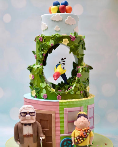 MY BAKER Top 25 Inspirational Baker Awards - @katescakedesign - The film up comes to life in this tiered cake, with Kevin the bird peeking his head out of a hole built into the cake.