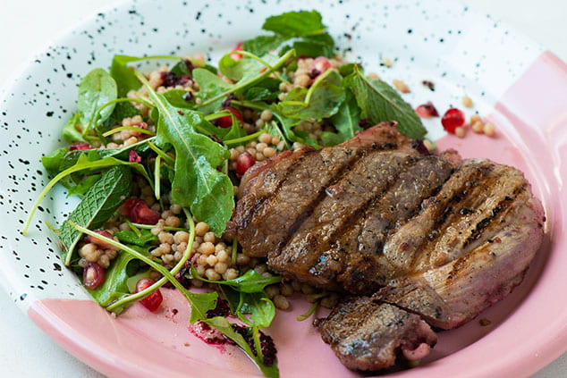 Chargrilled Hibiscus-Marinated Lamb With Rocket, Mint, Giant Couscous and Pomegranate Salad