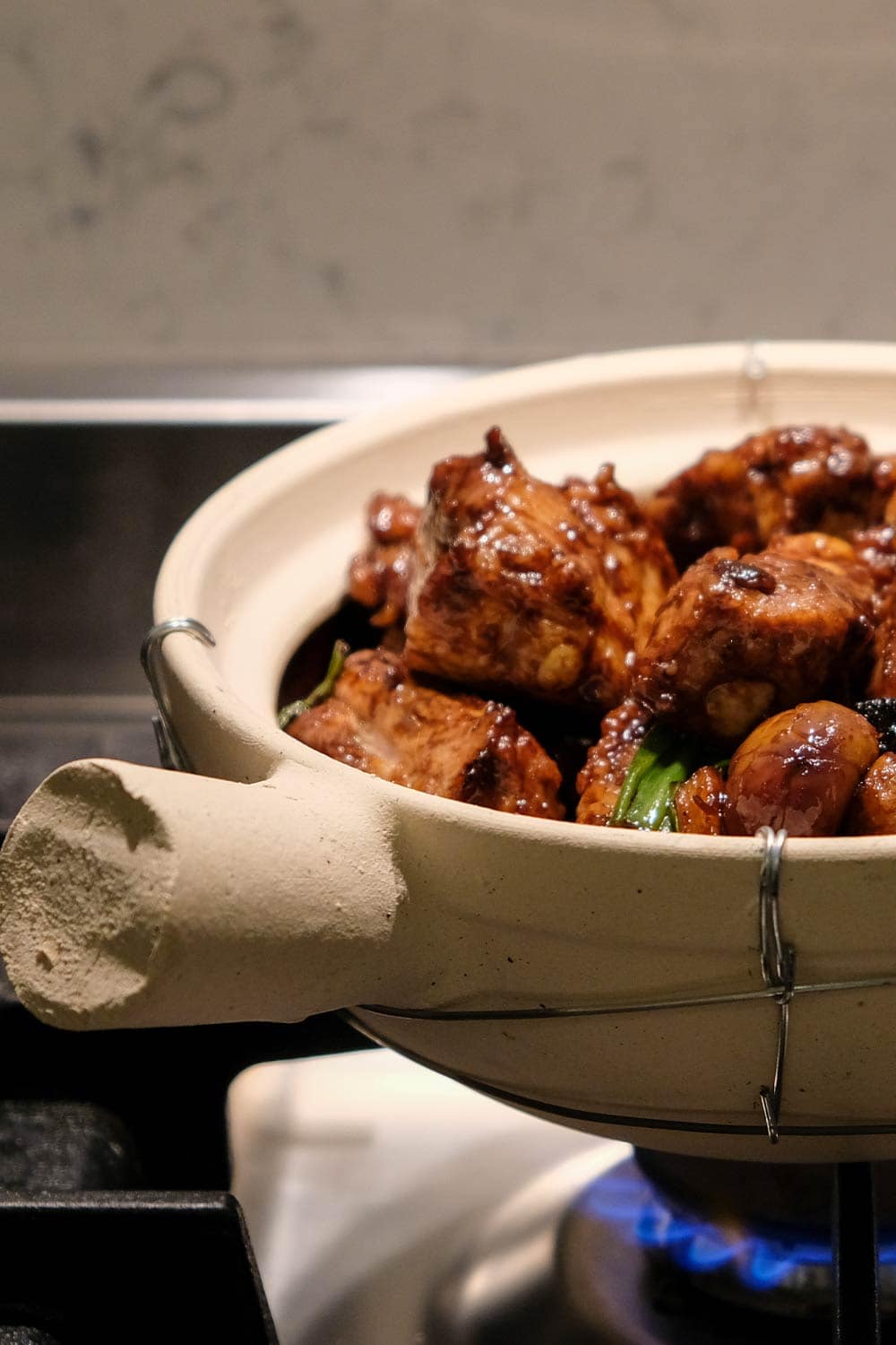 Braised pork ribs with chestnuts and black garlic