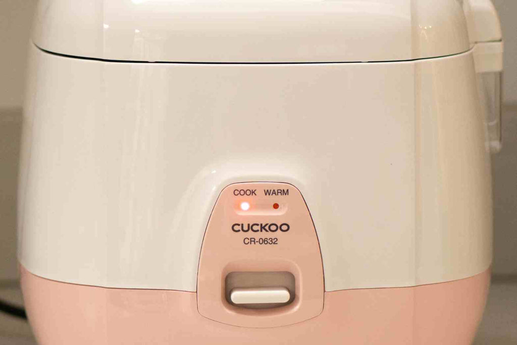 Step by step guide to using a rice cooker - set rice cooker to cook