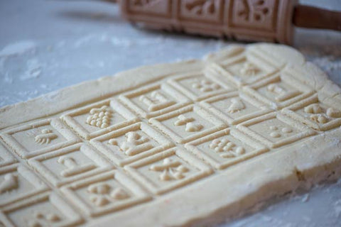 Make speculaas biscuits and using the taditional German moulds