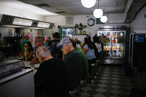 Senior people sitting in a diner