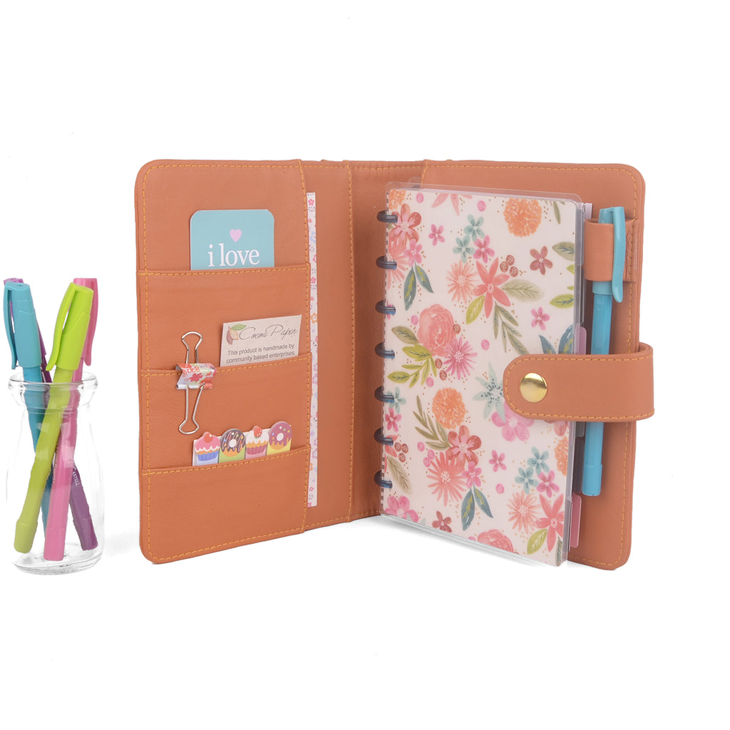 https://cdn.shopify.com/s/files/1/0111/2892/products/Small_Planner_Cover_Orange-1218-UL_1024x1024.jpg?v=1625298070