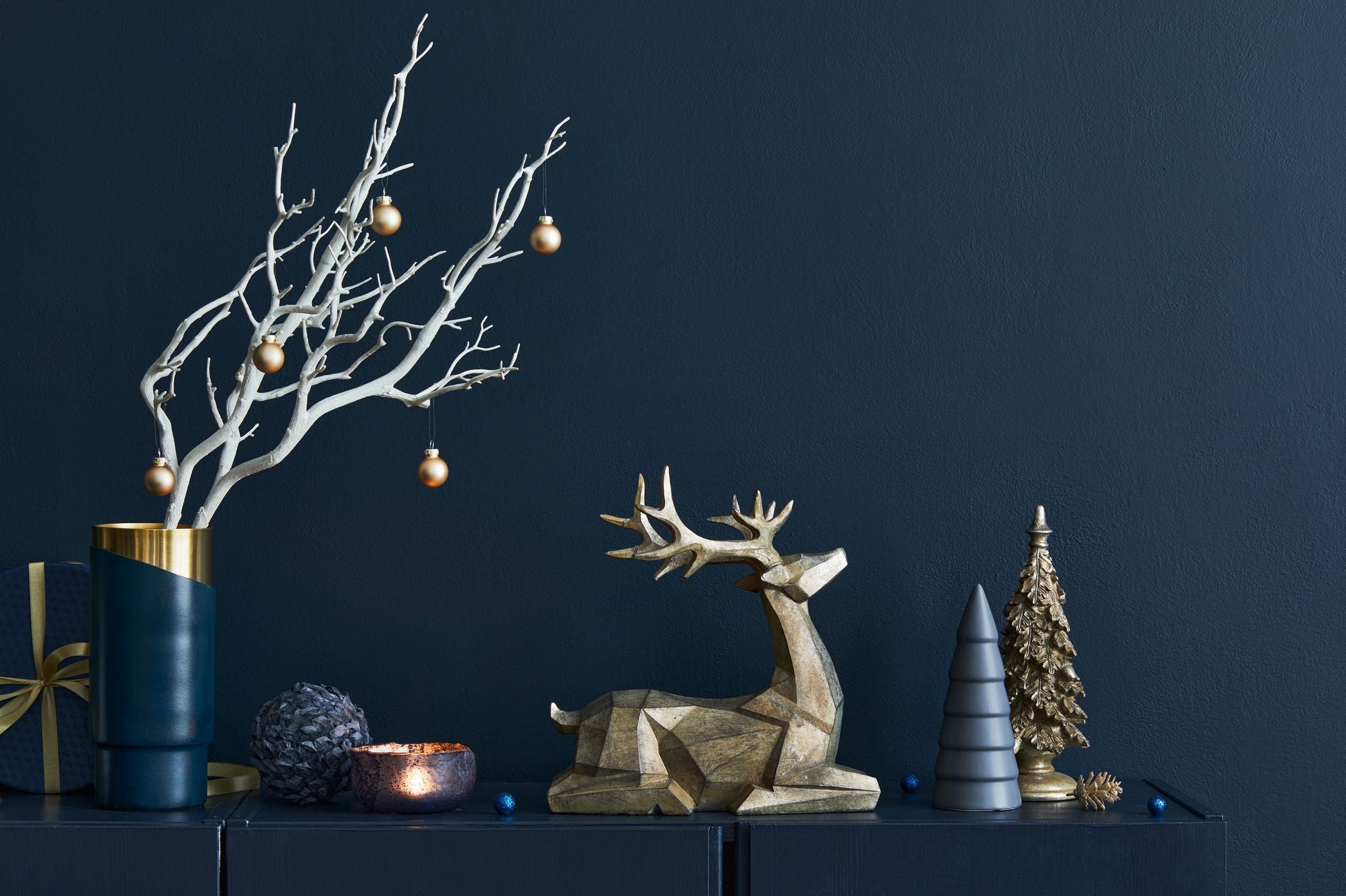 reindeer and tree mantle statues