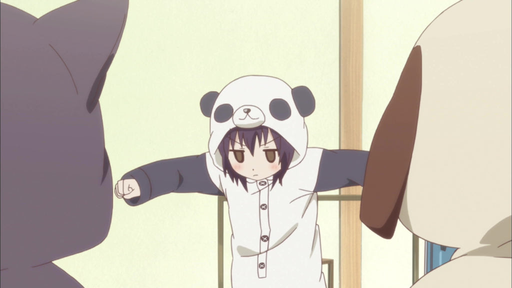 panda kigurumi showing off her costume