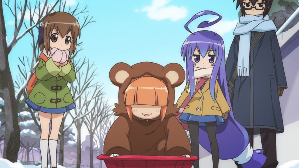 bear kigurumi riding a snow cart