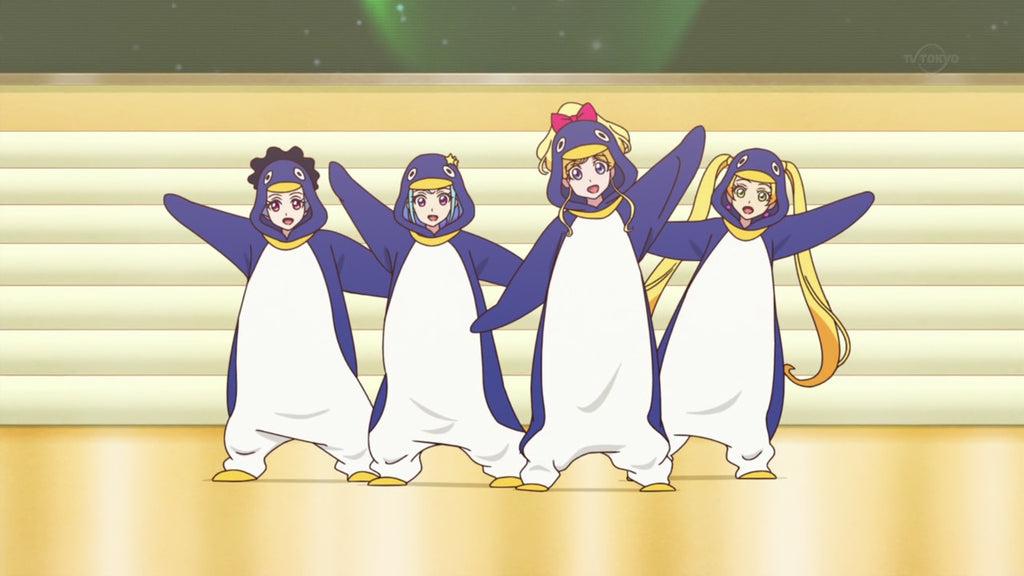 penguin kigurumi lifting their right hand