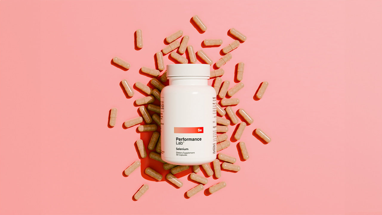 Performance Lab Selenium bottle and capsules against a pink background