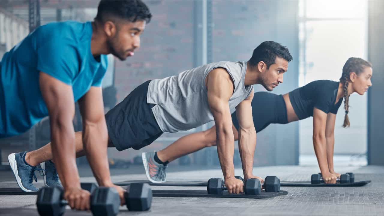 Body pump class members in a plank position working out whilst unaffected by 'creatine bloating'