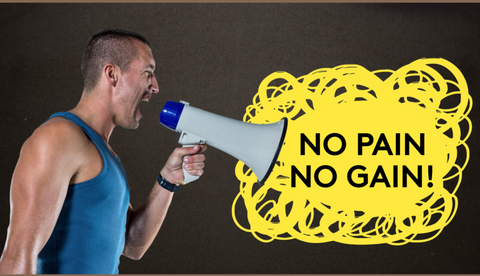 Male gym instructor shouting "No pain no gain!" through a megaphone.