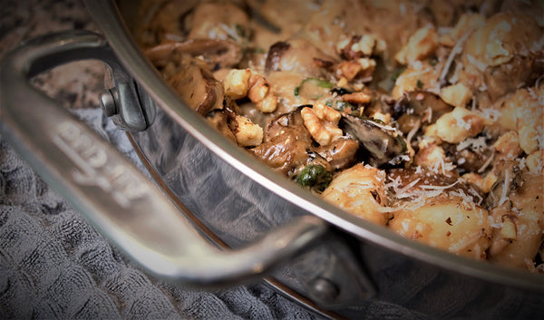 Wild mushroom gnocchi in all clad pan paired with pinot noir