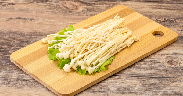 enoki mushroom on chopping board