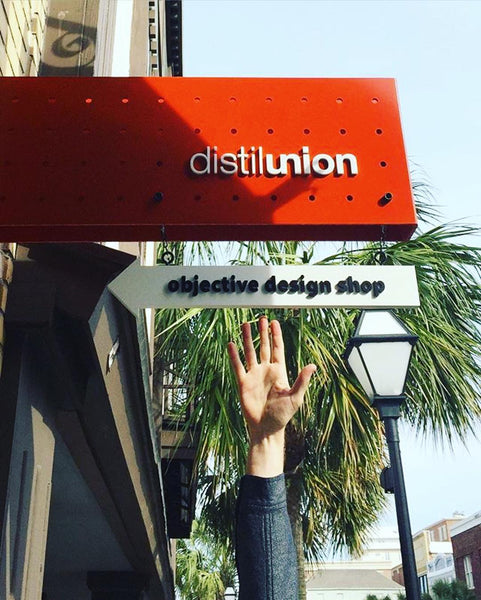 Distil Union Objective Design Shop sign on King Street in Charleston SC