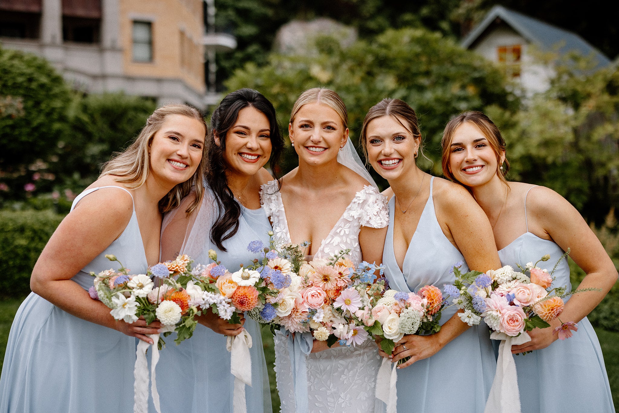 Bride and her bridesmaids with their English Garden-inspired Bouquets