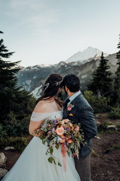 Stunning elopement bouquet at the top of a mountain