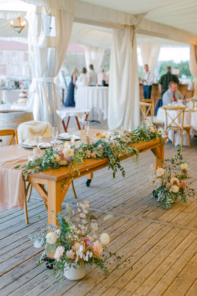 Arbor and aisle florals moved to the reception space after the ceremony.
