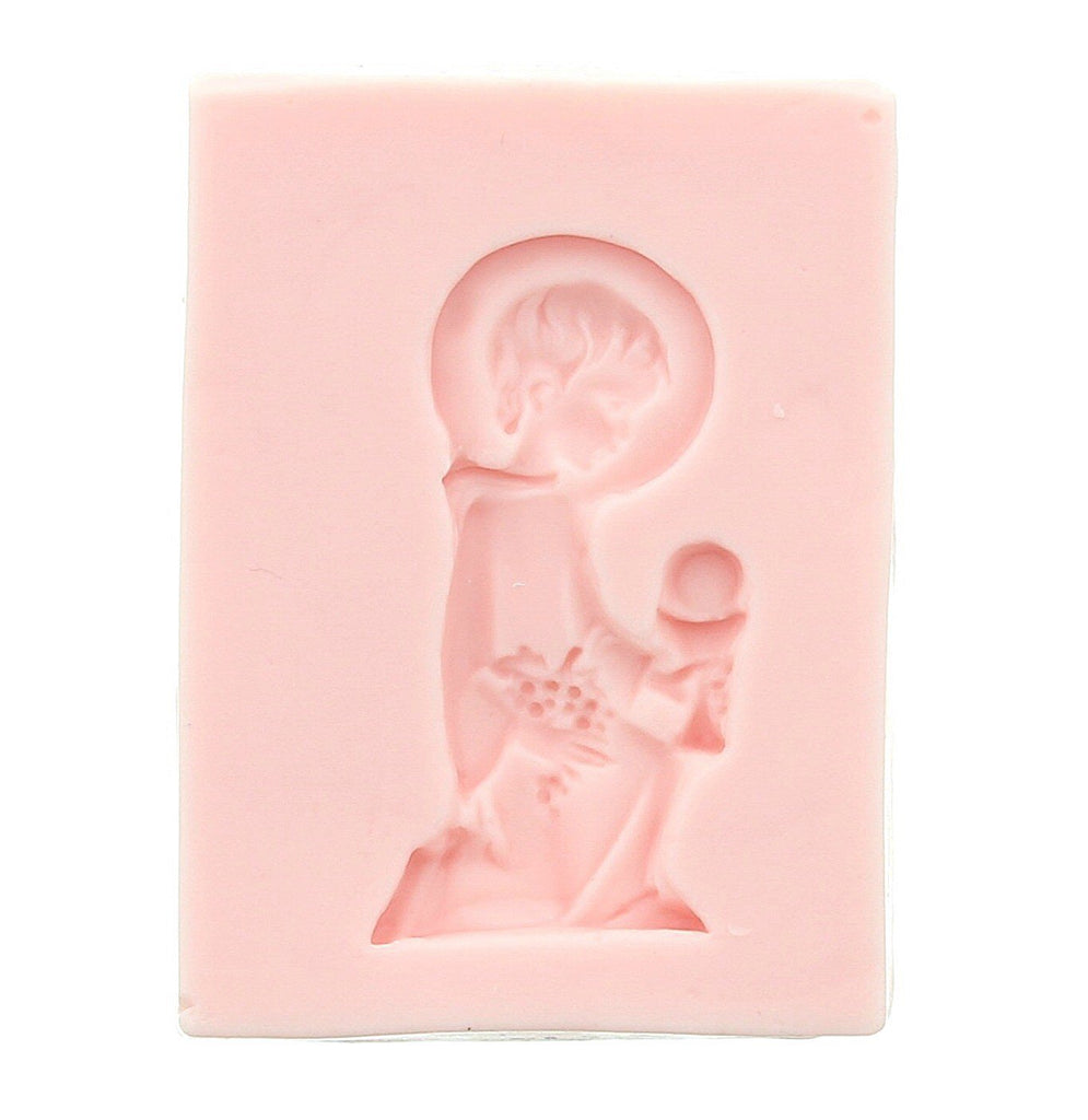 soap carvings of boy and girl