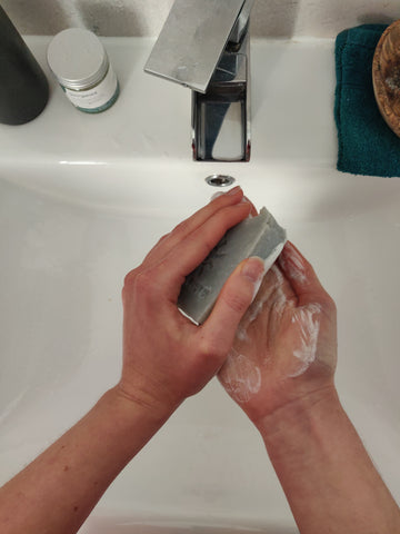 Washing hands step two, natural soap bar