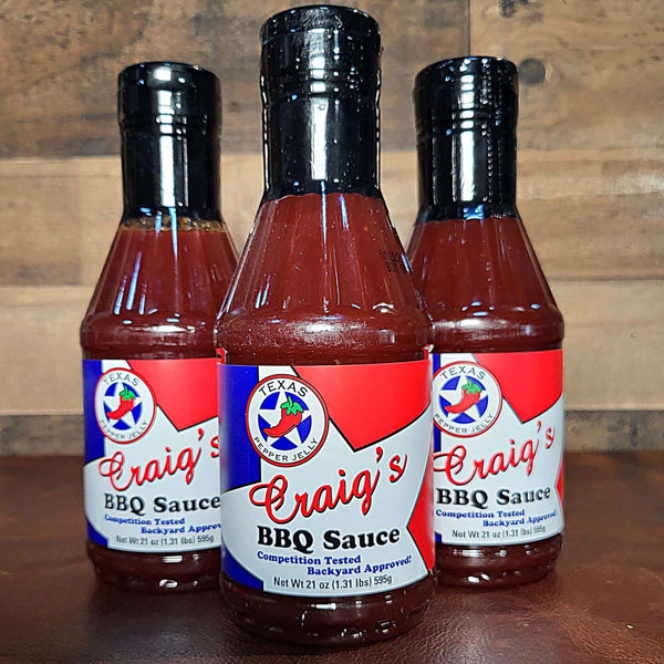 https://cdn.shopify.com/s/files/1/0112/1625/7124/products/TexasPepperJellyCraig_sBBQSauce_600x.jpg?v=1688074029