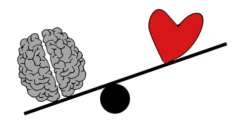 An image of a cartoon brain and heart on a scale, symbolising anxiety.