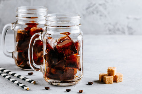 Espresso coffee ice cubes in jars