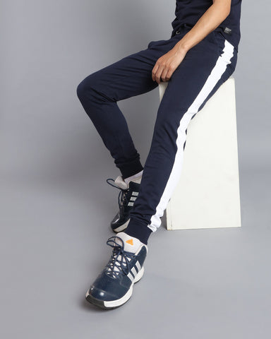 navy blue joggers with white stripe