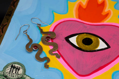 snake earrings on painted box