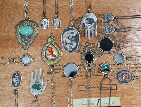 flat lay of necklaces on a wooden background
