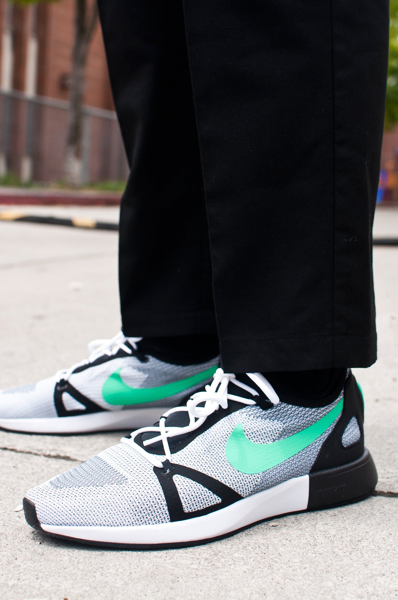 nike duel racer on feet