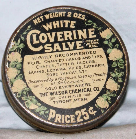 Vintage black drawing salve tin. For healing infections.