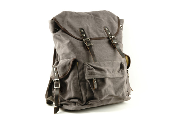 Waxed canvas backpack / rucksack with folded top and waxed canvas flap