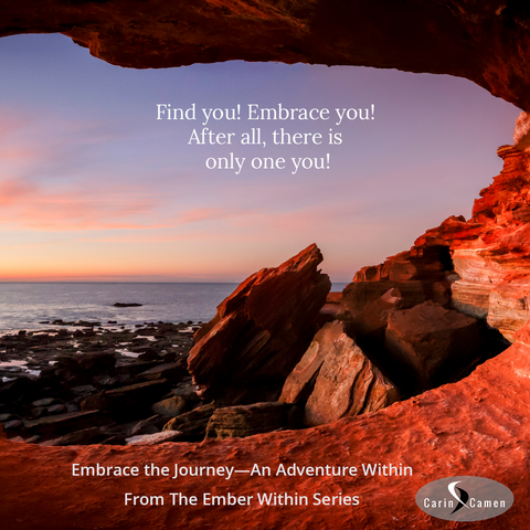 Looking out of a cave towards the ocean with a brilliant sunset.