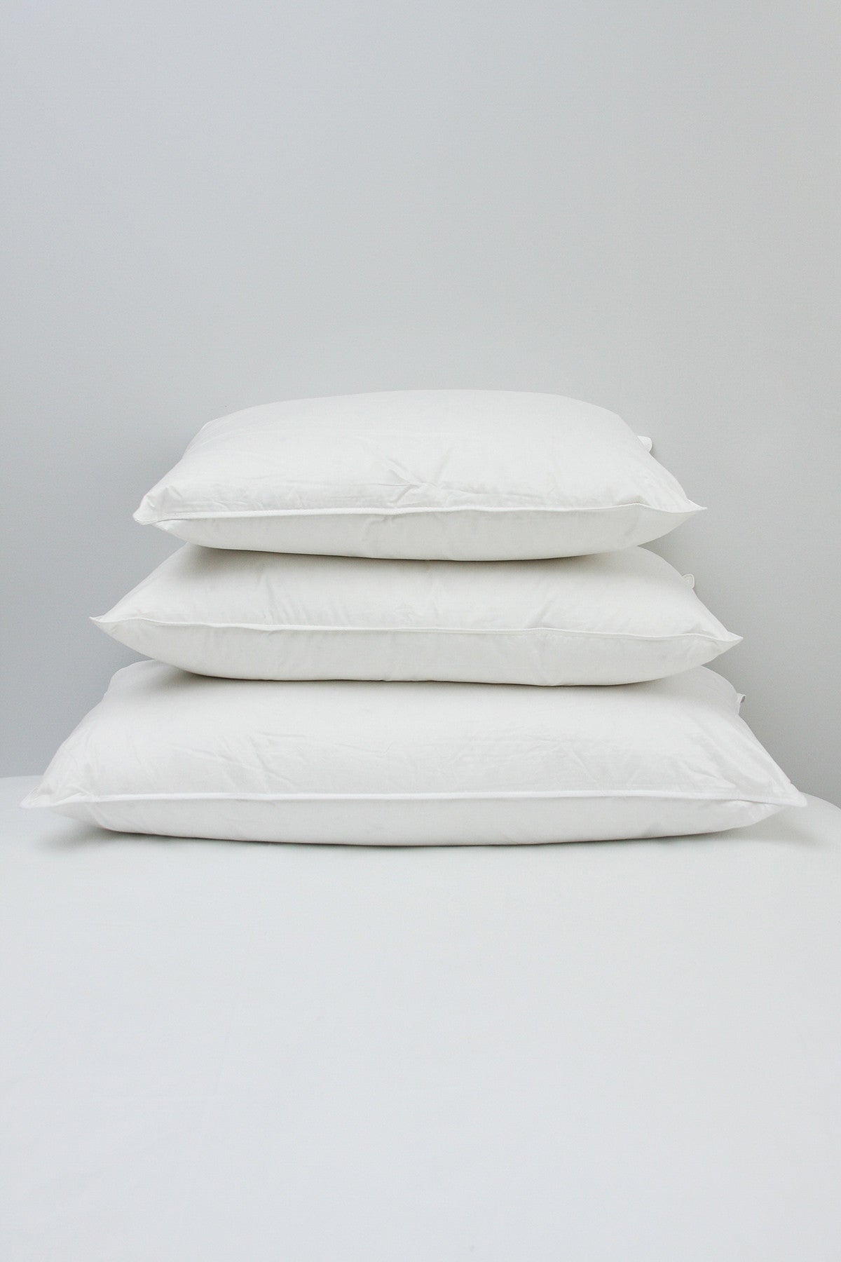 https://cdn.shopify.com/s/files/1/0114/2302/articles/Pillow_Size_Stack_vertical.jpg?v=1452198619