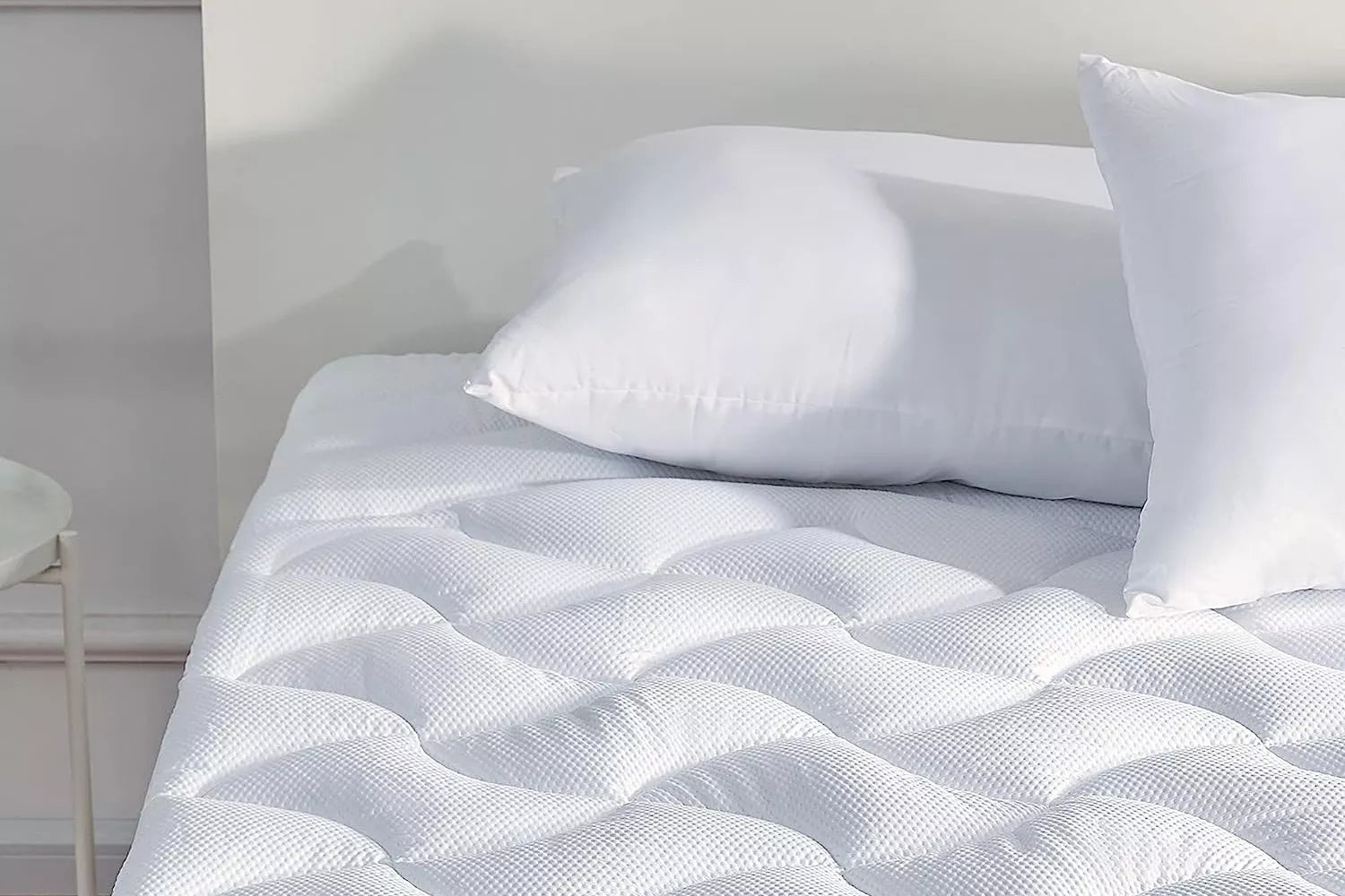 This Cooling Mattress Topper Feels Like Sleeping on a ‘Fluffy Cloud,’ and It’s on Sale at Amazon