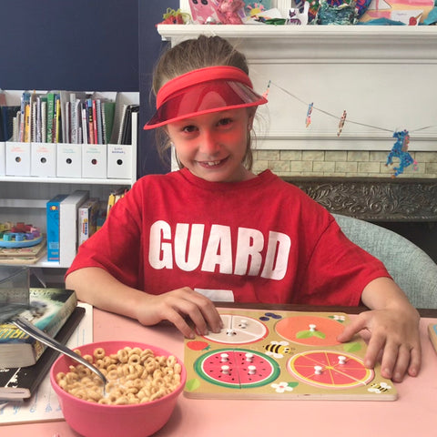 kid dressed as lifeguard