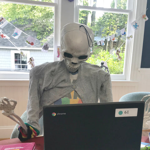 Skeleton in sweater remote learning