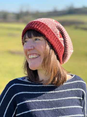 Nicky in the Love Grows slouchy stranded colourwork hat knit in Cambrian wool British wool