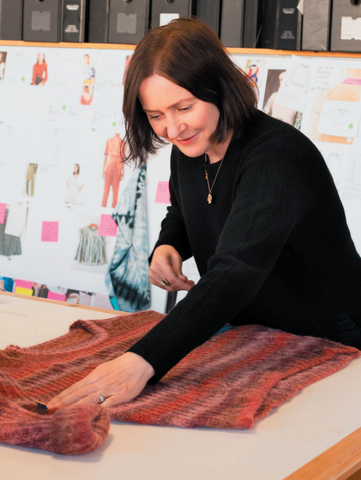 Margaret works on a sweater design at her San Fransisco design studio.
