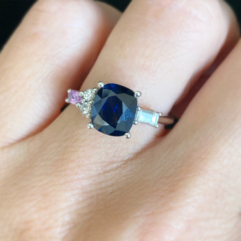 Sapphire and heirloom cluster engagement ring