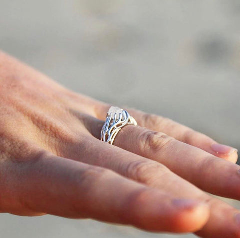 Rough diamond engagement ring with unique setting