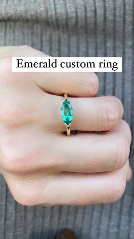 Marquise emerald engagement ring