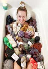 bathtub filled with yarn