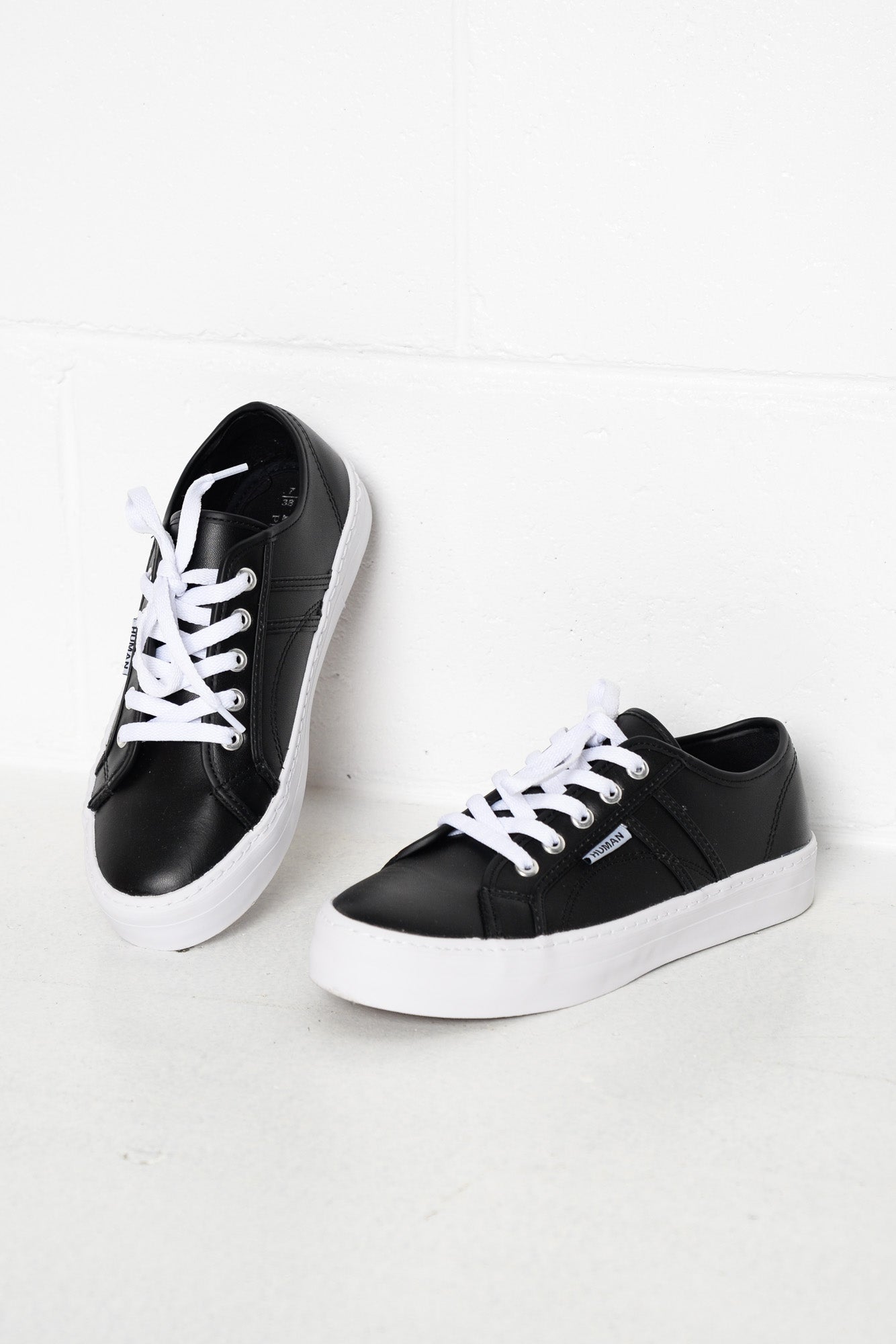 black leather sneakers white sole