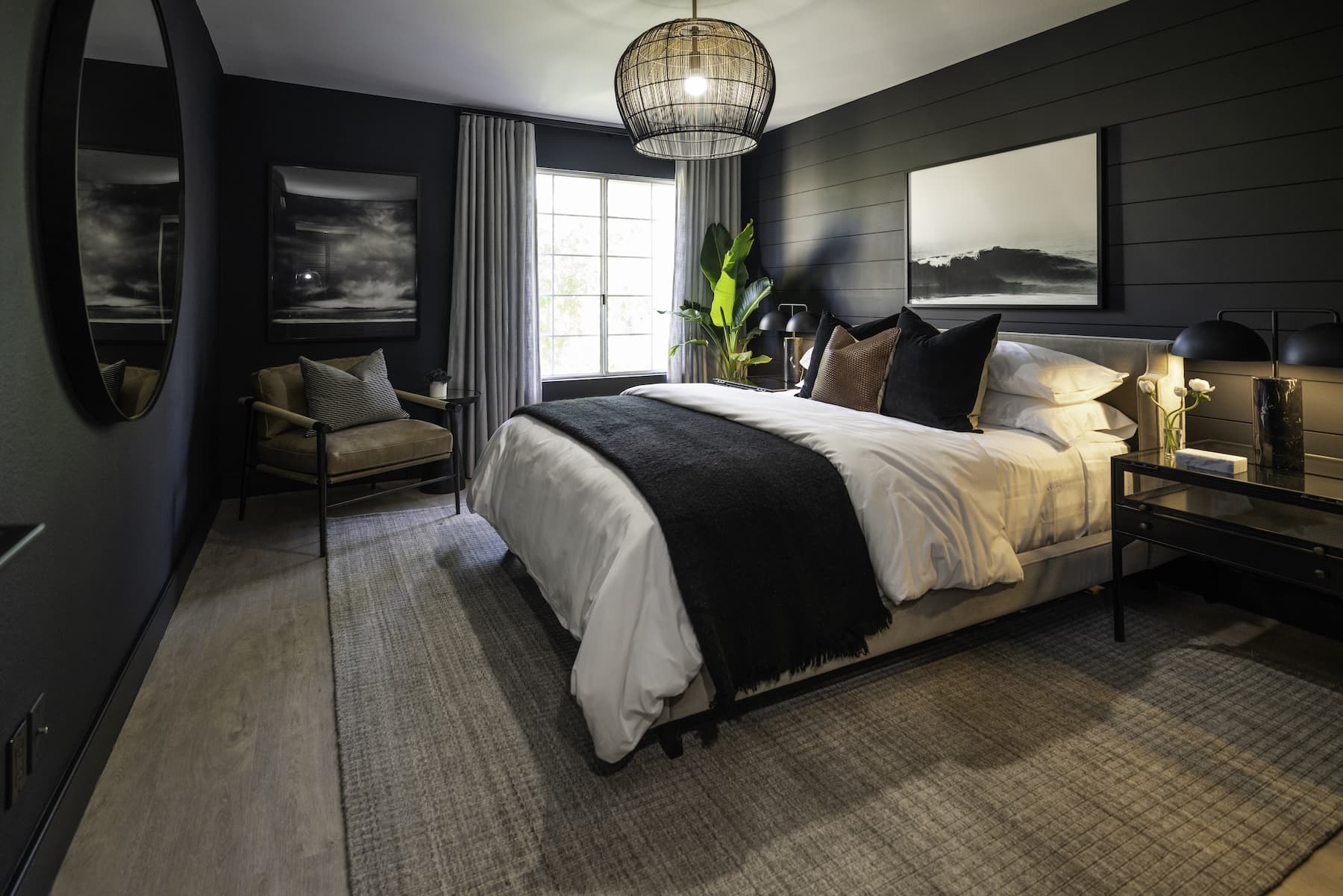renovated bedroom with chic black and neutral color scheme