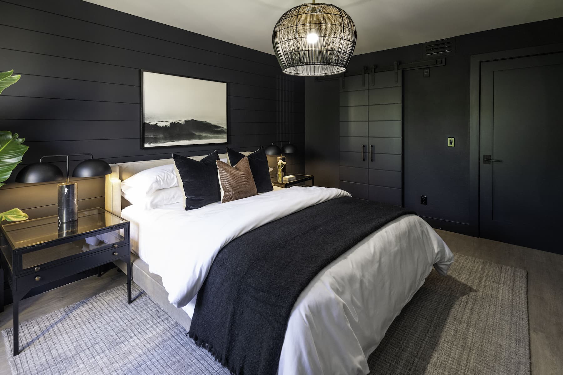 photo of bedroom with sliding barn door for closet space