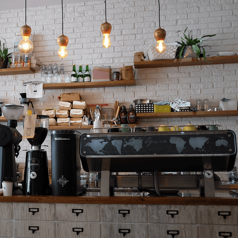 Coffee Shop with Butcher Block Countertop and matching wood shelves