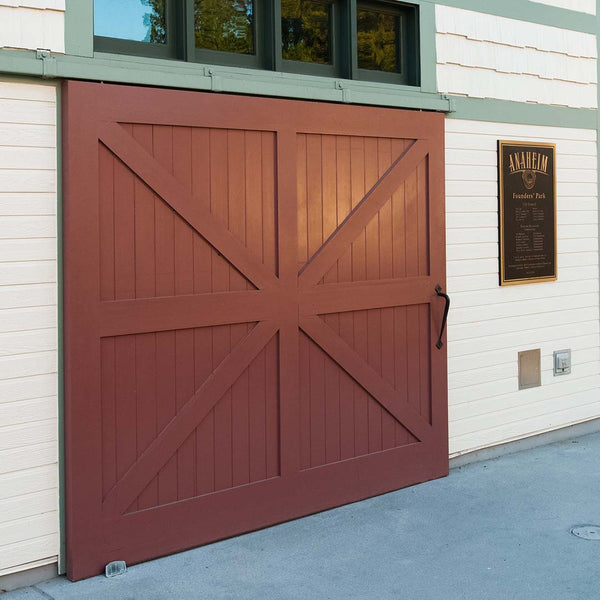 Red wide sliding exterior door at Founders Park